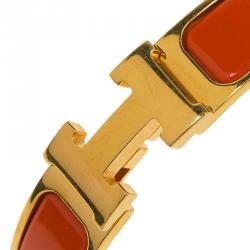 Pre Owned Hermes Clic Clac H Orange Enamel Gold Plated Narrow Bracelet GM
