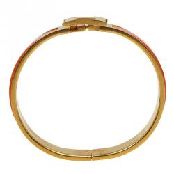 Pre Owned Hermes Clic Clac H Orange Enamel Gold Plated Narrow Bracelet GM