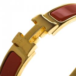 Pre Owned Hermes Clic Clac H Orange Enamel Gold Plated Narrow Bracelet PM