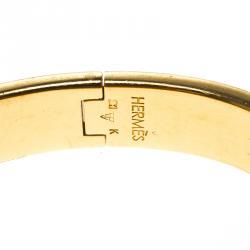 Pre Owned Hermes Clic Clac H Orange Enamel Gold Plated Narrow Bracelet PM