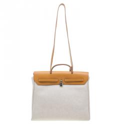 مملوكة مسبقًا Hermes Tan Leather and Beige Toile Canvas Large Herbag