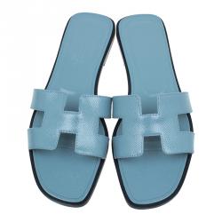 Pre Owned صندل سلايد هيرمس أوران جلد لامع أزرق فاتح مقاس 36.5