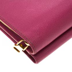 مملوكة مسبقًا محفظة لويفي جلد وردي مضغوطة