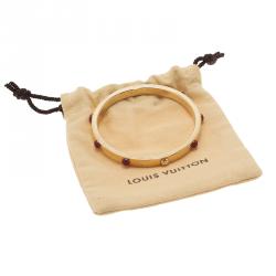 Pre Owned Louis Vuitton Gimme A Clue Gold Tone Bangle Bracelet