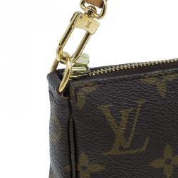 مملوكة مسبقًا حقيبة يد صغيرة للإكسسوارات لوي فيتون كانفاس مونوغرامي