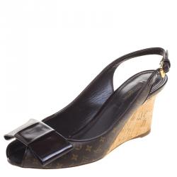 Louis Vuitton Monogram Wedge Bow Rivoli Sandals at 1stDibs
