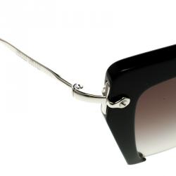 Pre Owned نظارة شمسية ميو ميو SMU 10Q مفرغة سوداء