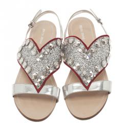 Pre Owned صندل ميو ميو جلد فضي ميتالك بقلب براق فلات مقاس 38.5
