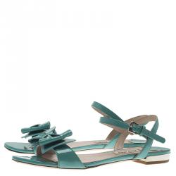 مملوكة مسبقًا  صندل ميو ميو بفيونكة أخضر لامع مقاس 35.5