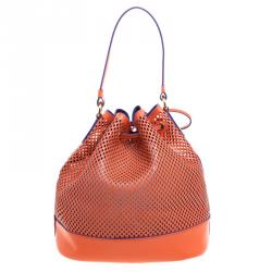 Pre Owned Moschino Orange Perforated Leather Drawstring Bucket Hobo
