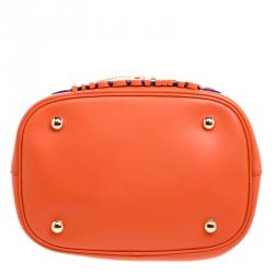 Pre Owned Moschino Orange Perforated Leather Drawstring Bucket Hobo