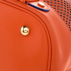 Pre Owned Moschino Orange Perforated Leather Drawstring Bucket Hobo