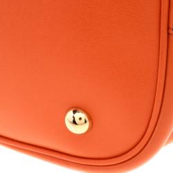 Pre Owned Moschino Orange Perforated Leather Drawstring Bucket Hobo