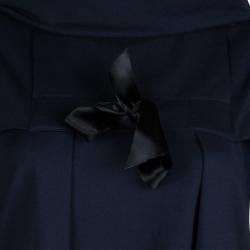 مملوكة مسبقًا توب سان لوران باريس تريكو أزرق كحلي برقبة كبيرة وفيونكة M