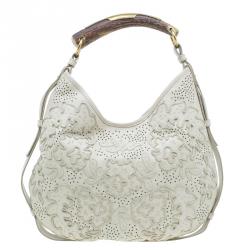 Pre Owned Saint Laurent Paris Cream Leather Limited Edition Mombasa Horn Hobo Bag
