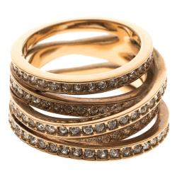 Pre Owned Swarovski Crystal Studded Rose Gold Tone Fancy Band Ring Size 52