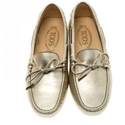 Pre Owned Tod's Metallic Gold Bow Detail Driving Loafers Size 36.5
