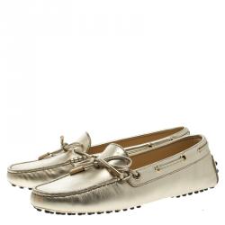 Pre Owned Tod's Metallic Gold Bow Detail Driving Loafers Size 36.5