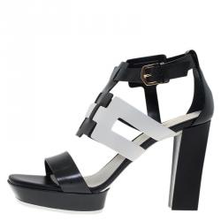 مملوكة مسبقًا صندل تودز جلد أسود وأبيض مفرغ مقاس 37.5