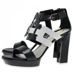 مملوكة مسبقًا صندل تودز جلد أسود وأبيض مفرغ مقاس 37.5