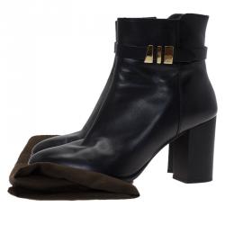 Pre Owned حذاء بوت كاحل تودز بإبزيم وكعب عريض جلد أسود مقاس 39