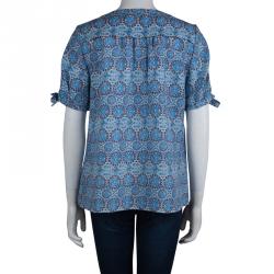 مملوكة مسبقًا بلوزة توري برش زرقاء موردة مطبوعة بأكمام قصيرة M