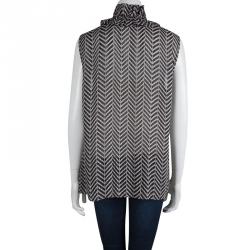 Pre Owned توب توري برش بني طباعة شيفرون بكشكشة بلا أكمام XL