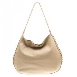 Pre Owned Tory Burch Light Beige Leather Pyramid Studs Hobo