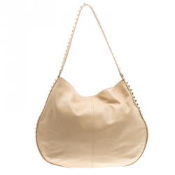 Pre Owned Tory Burch Light Beige Leather Pyramid Studs Hobo