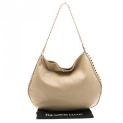 Pre Owned Tory Burch Light Beige Leather Pyramid Studs Hobo