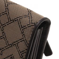 Pre Owned Tumi Brown Leather and Canvas Logo Continental Flap Wallet