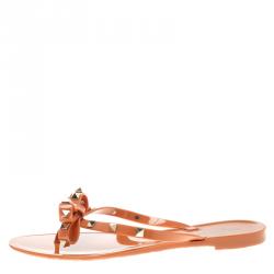 Pre Owned Valentino Orange Jelly Rockstud Bow Flat Sandals Size 39