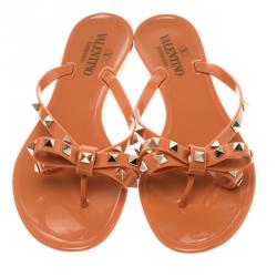 Pre Owned Valentino Orange Jelly Rockstud Bow Flat Sandals Size 39