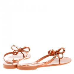 Pre Owned Valentino Orange Jelly Rockstud Bow Flat Sandals Size 39