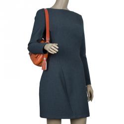 Pre Owned Versace Jeans Orange Leather Tassel Trapuntata Shoulder Bag