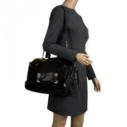 مملوكة مسبقًا حقيبة فرساتشي سويدي وجلد سوداء