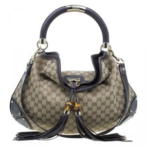Pre Owned Gucci Beige Monogram Canvas Large Indy Top Handle Bag