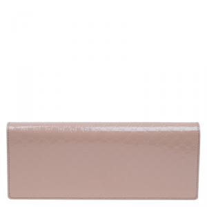 مملوكة مسبقًا Gucci Nude Micro Guccissima Patent Leather Broadway Clutch