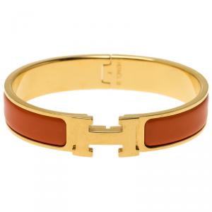 Pre Owned Hermes Clic Clac H Orange Enamel Gold Plated Bracelet