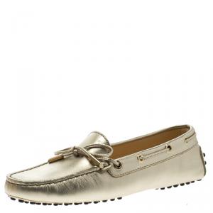 مملوكة مسبقًا Tod's Metallic Gold Bow Detail Driving Loafers Size 36.5