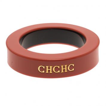 Pre Owned CH Carolina Herrera Orange Resin Gold Tone Wide Bangle 21cm