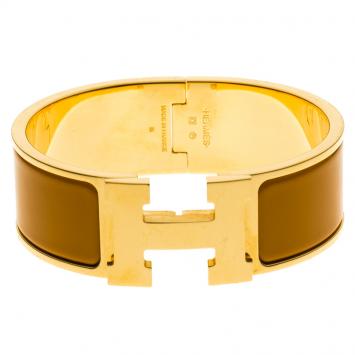 Pre Owned Hermes Clic Clac H Orange Enamel Gold Plated Wide Bracelet PM
