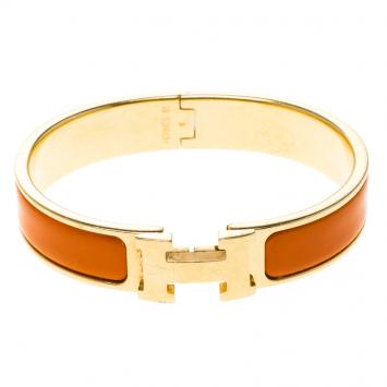 Pre Owned Hermes Clic Clac H Orange Enamel Gold-Plated Narrow Bracelet PM