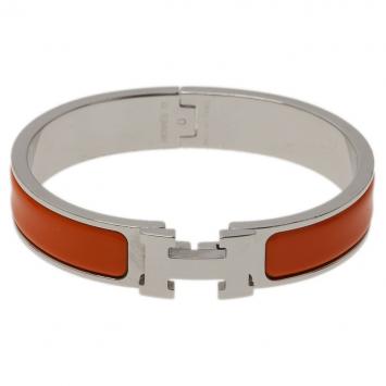 Pre Owned Hermes Clic Clac H Orange Enamel Palladium Plated Bracelet