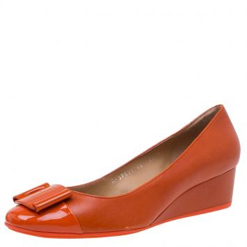 Pre Owned Salvatore Ferragamo Orange Leather Silda Vara Plaque Wedge Pumps Size 40