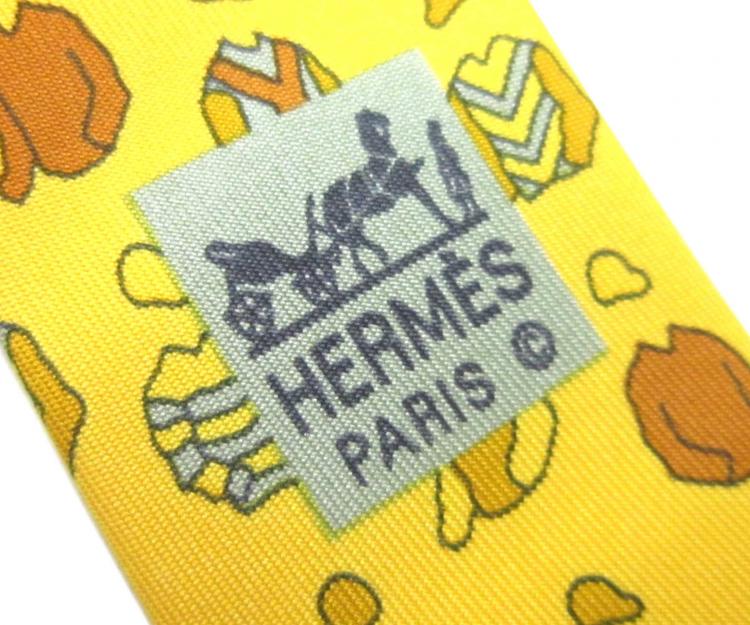 Pre Owned Hermes Yellow Jacket and Cap Print Silk Tie