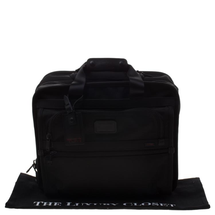 Pre Owned Tumi Black Nylon Carry On Garment Rolling Suitcase