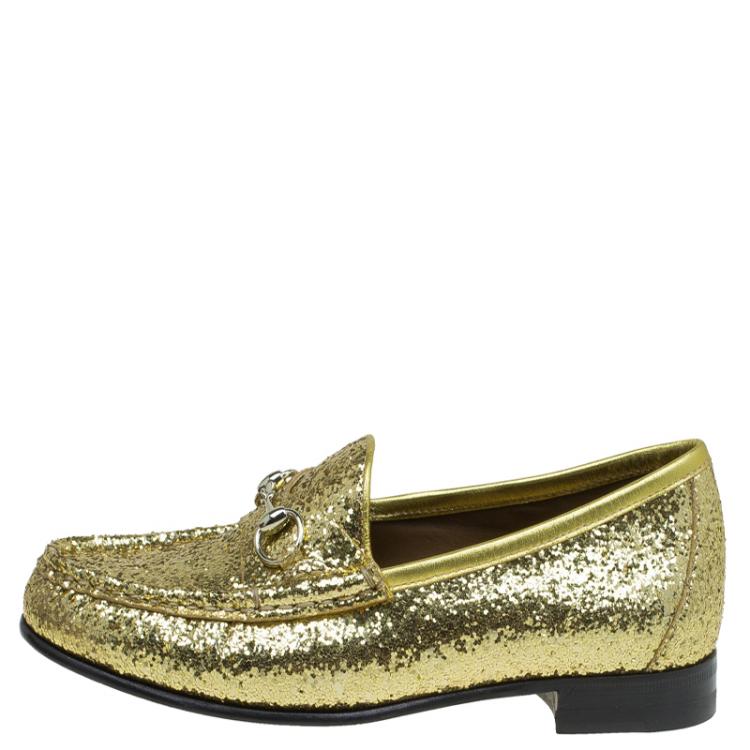 gold gucci loafers