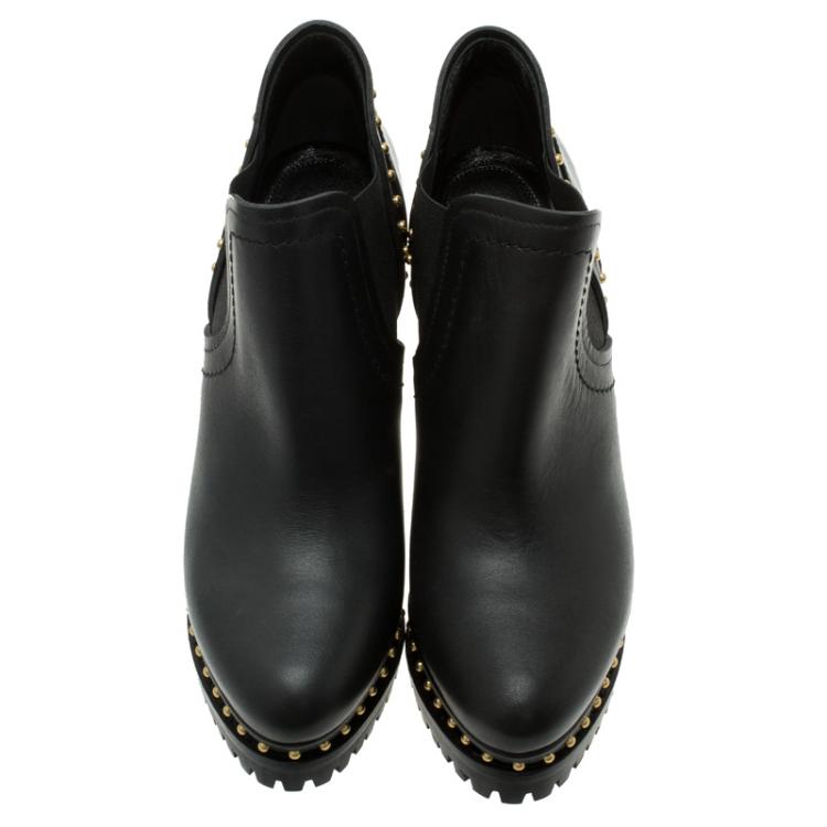 مملوكة مسبقًا Alexander McQueen Black Studded Platform Chelsea Ankle Boots Size 39