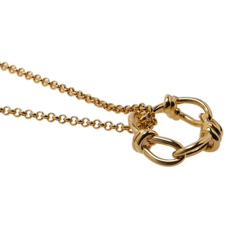 Pre Owned Balenciaga Continuity Bow Round Pendant Gold Tone Necklace
